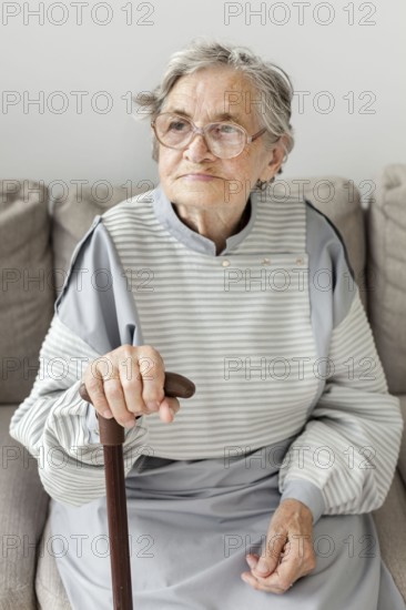 Grandmother with eyeglasses home
