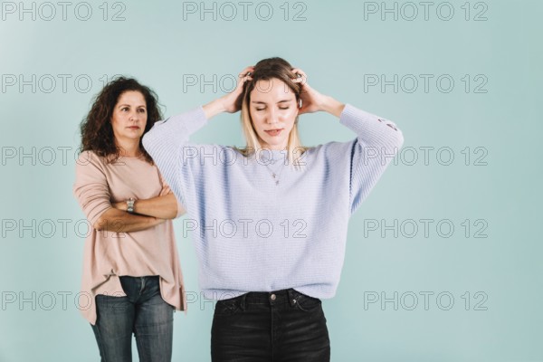 Young woman arguing with mother