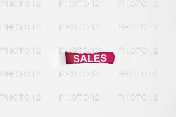 Sales inscription torn paper