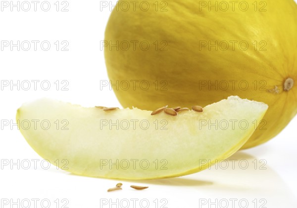 Yellow Spanish Melon (cucumis melo), Fruits against White Background