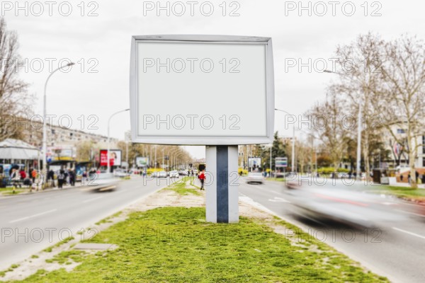 White billboard advertising mockup busy street