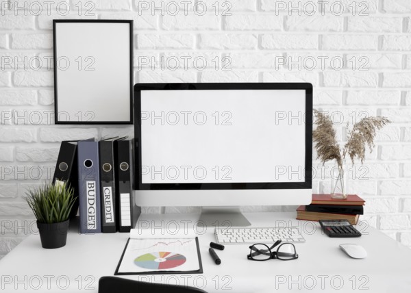 Front view office desk with computer screen glasses