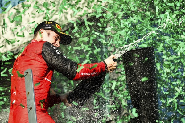 MELBOURNE, AUSTRALIA, APRIL 10: Charles Leclerc of Scuderia Ferrari celebrates winning the 2022