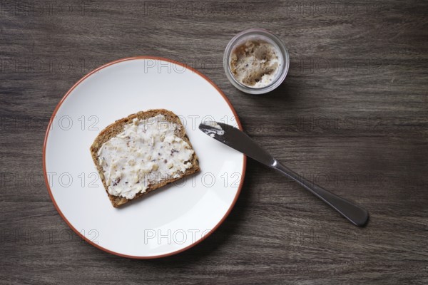 slice of bread and dripping or crackling fat or lard with greaves called Schmalzbrot in Germany