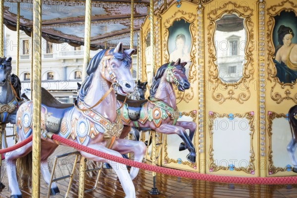 Florence, Italy - Circa March 2022: vintage carousel horse - antique attraction