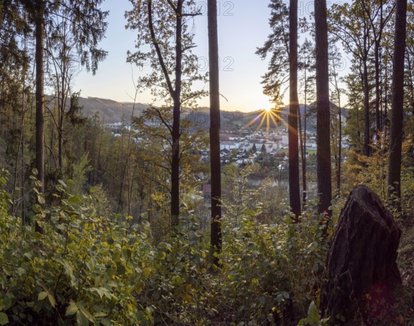 Autumn atmosphere, view from the edge of the forest to the city of Leoben at sunset, Leoben,