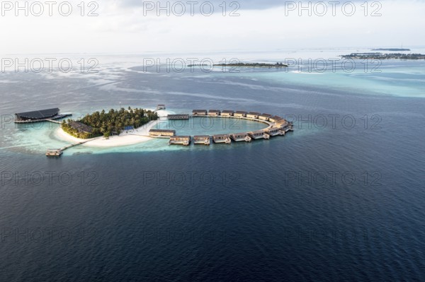 Aerial view, Kudadoo Island resort with beaches and water bungalows, Lhaviyani Atoll, Maldives,