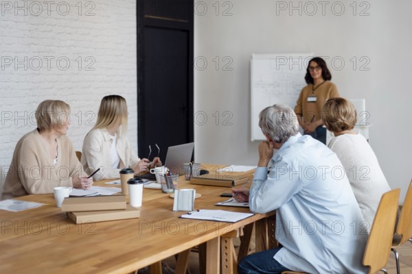 Medium shot business people meeting