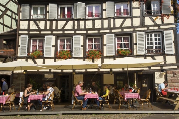 Restaurant in a half-timbered house in the old town of Strasbourg, Alsace, France, Europe