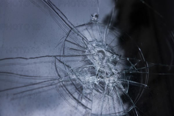 Pattern of smashed window pane, glass is splintered, window pane broken, close-up, Portbail,