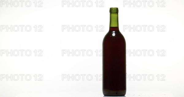 Bottle of Red Wine against White Background