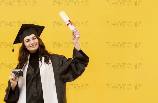 Graduate student with camera diploma