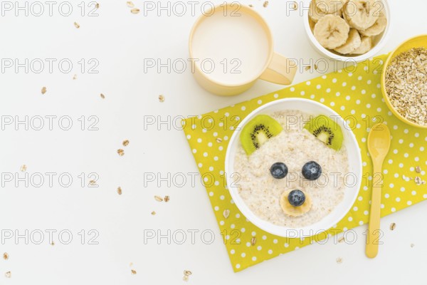 Copy space milk oat flakes with fruits
