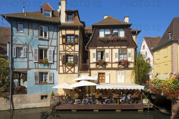 Half-timbered houses and restaurants, canal in the Quartier des Tanneurs, tanners' quarter, and in