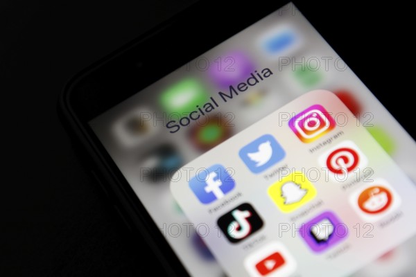 Social media icon, detailed view of a smartphone with social media apps, Facebook, Twitter,