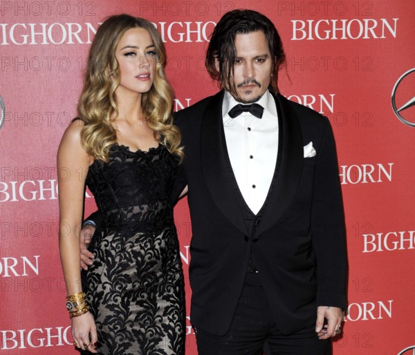 Amber Heard and Johnny Depp at the 27th Annual Palm Springs International Film Festival Awards Gala