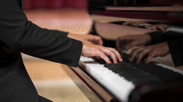Man having classical piano recital