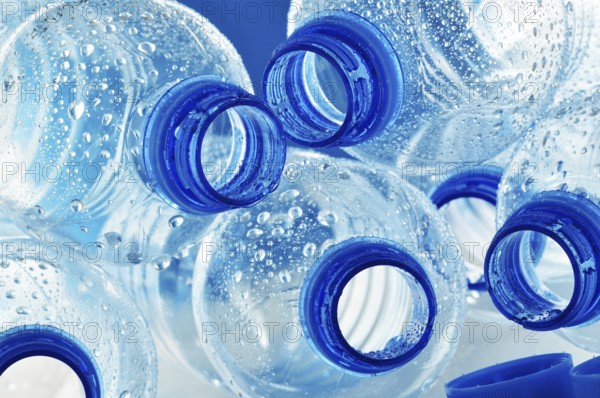 Composition with empty polycarbonate plastic bottles of mineral water