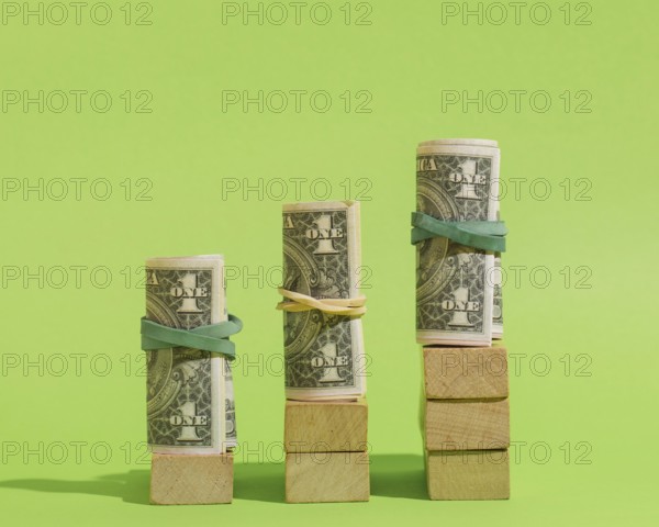 Arrangement with banknotes wooden cubes