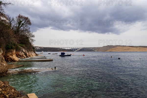 View of the bridge to the island of Krk from the steep coast near Ostro near Kraljevica, Kvarner