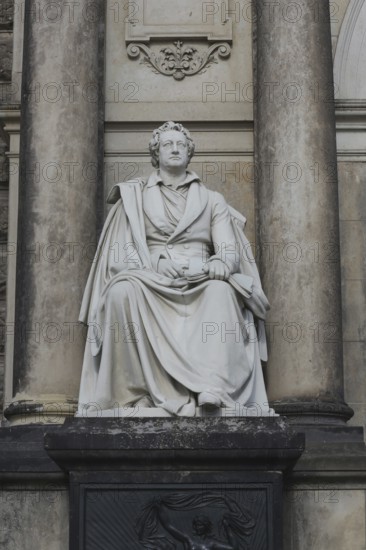An upright shot of a statue to Germany's most famous poet and writer Johann Wolfgang (von) Goethe