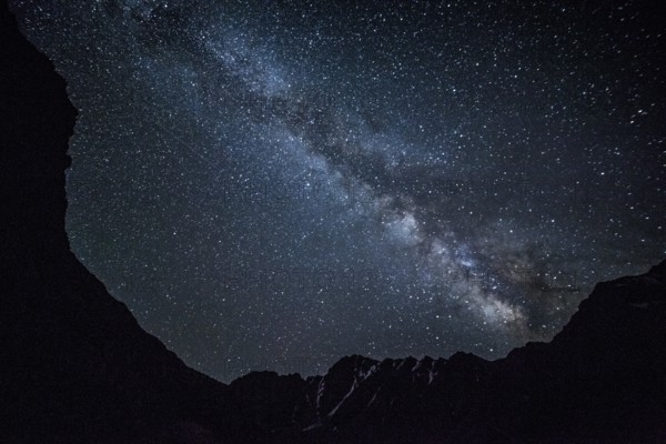 Star night sky in mountains