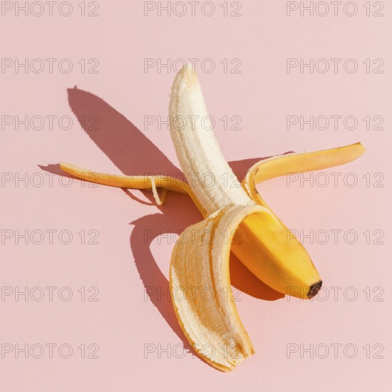 Top view banana pink background. Beautiful photo