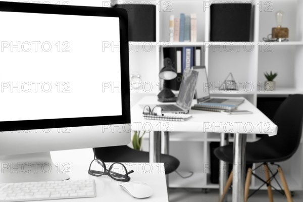 Office desks with computer screen laptop