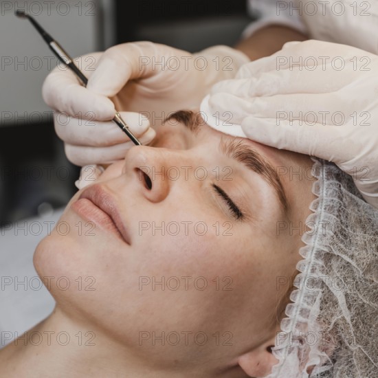 Young woman wellness center during skin treatment