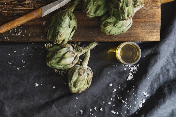 Artichokes glass oil. High resolution photo