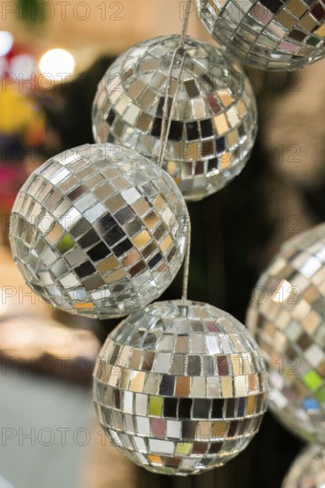 Disco balls with mirror pieces for dancing in a disco club