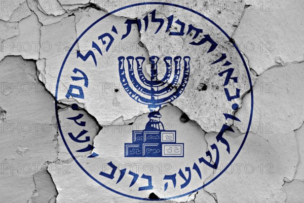 Flag of Mossad painted on cracked wall