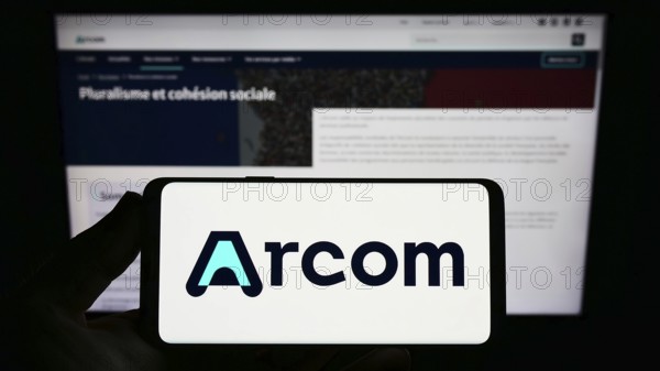 Stuttgart, Germany, 12-02-2022: Person holding smartphone with logo of French digital regulation