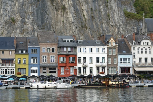 Belgium - 11 August 2019: horizontal view of the Meuse River and the historic old riverside town of