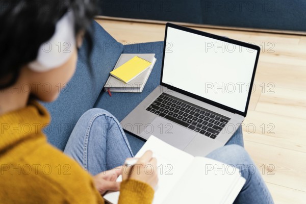 Teenage girl with headphones laptop during online school. Beautiful photo