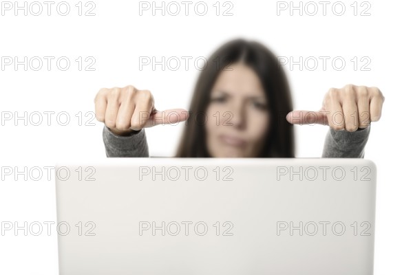 Unhappy Young Woman with Laptop Showing Thumbs on Sides Signs, Emphasizing Unsatisfactory.
