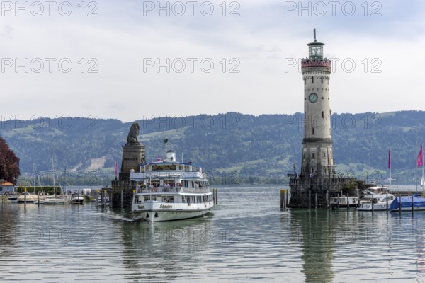 Bavarian Lion and New Lighthouse at the harbour entrance and the ship Swabia enters the harbour,