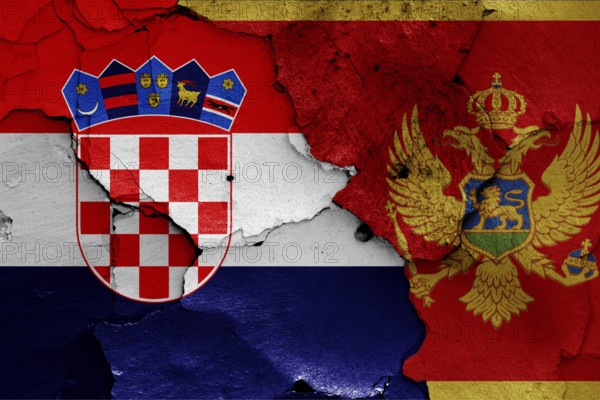 Flags of Croatia and Montenegro painted on cracked wall