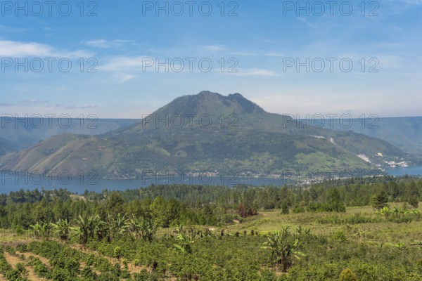 The volcano Pusuk Buhit, a 2000m high mountain at the Lake Toba, the largest volcanic lake in the