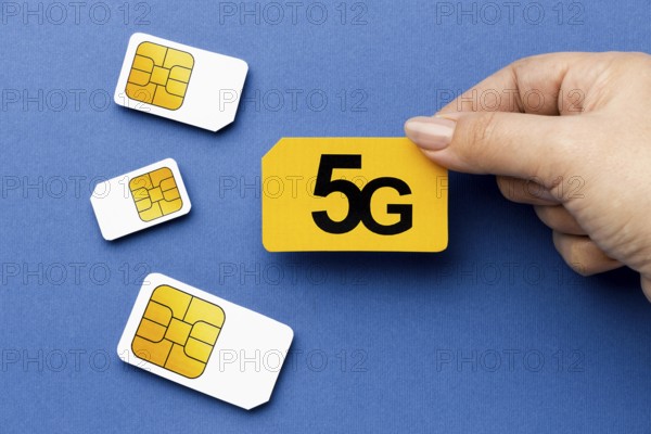 Top view hand holding 5g sim card