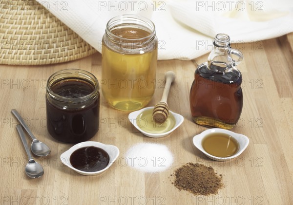 Fine-grained sugar, brown sugar, maple syrup, molasses and honey
