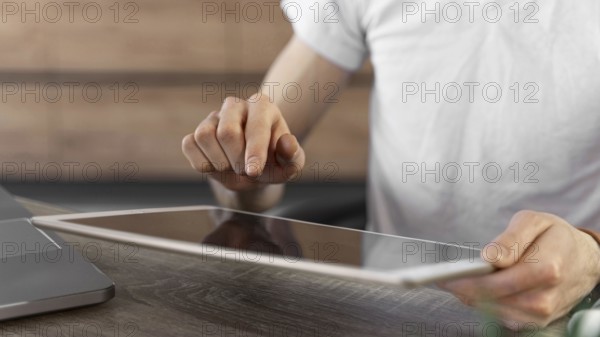 Man using tablet device