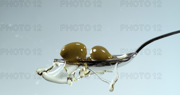 Green Olives, Olea europaea, Falling in a Spoon