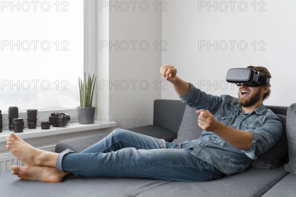 Happy man with vr glasses full shot