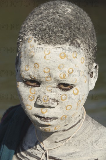 Surma boy with body painting, face painting, Surma tribe, Kibish, Omo Valley, Ethiopia, Africa