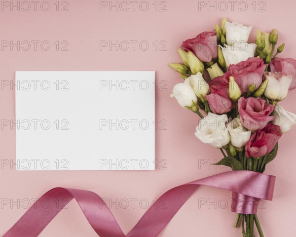 Top view beautiful roses bouquet with empty card. Resolution and high quality beautiful photo