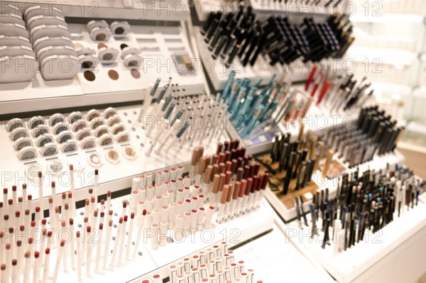 Shelves with makeup products in a cosmetics store indoor with make up products