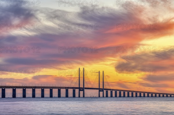 The Øresund Bridge between Denmark and Sweden at a spectacular sunset
