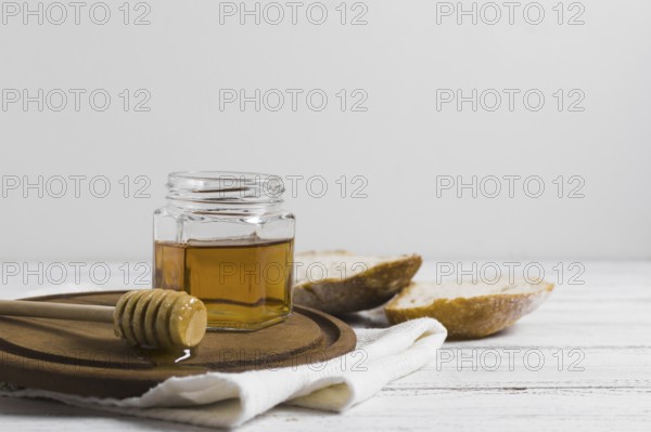 Bread with honey wooden board