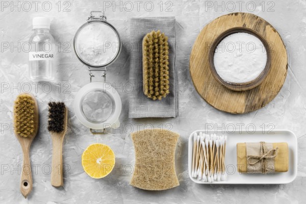 Flat lay eco friendly cleaning products with lemon baking soda